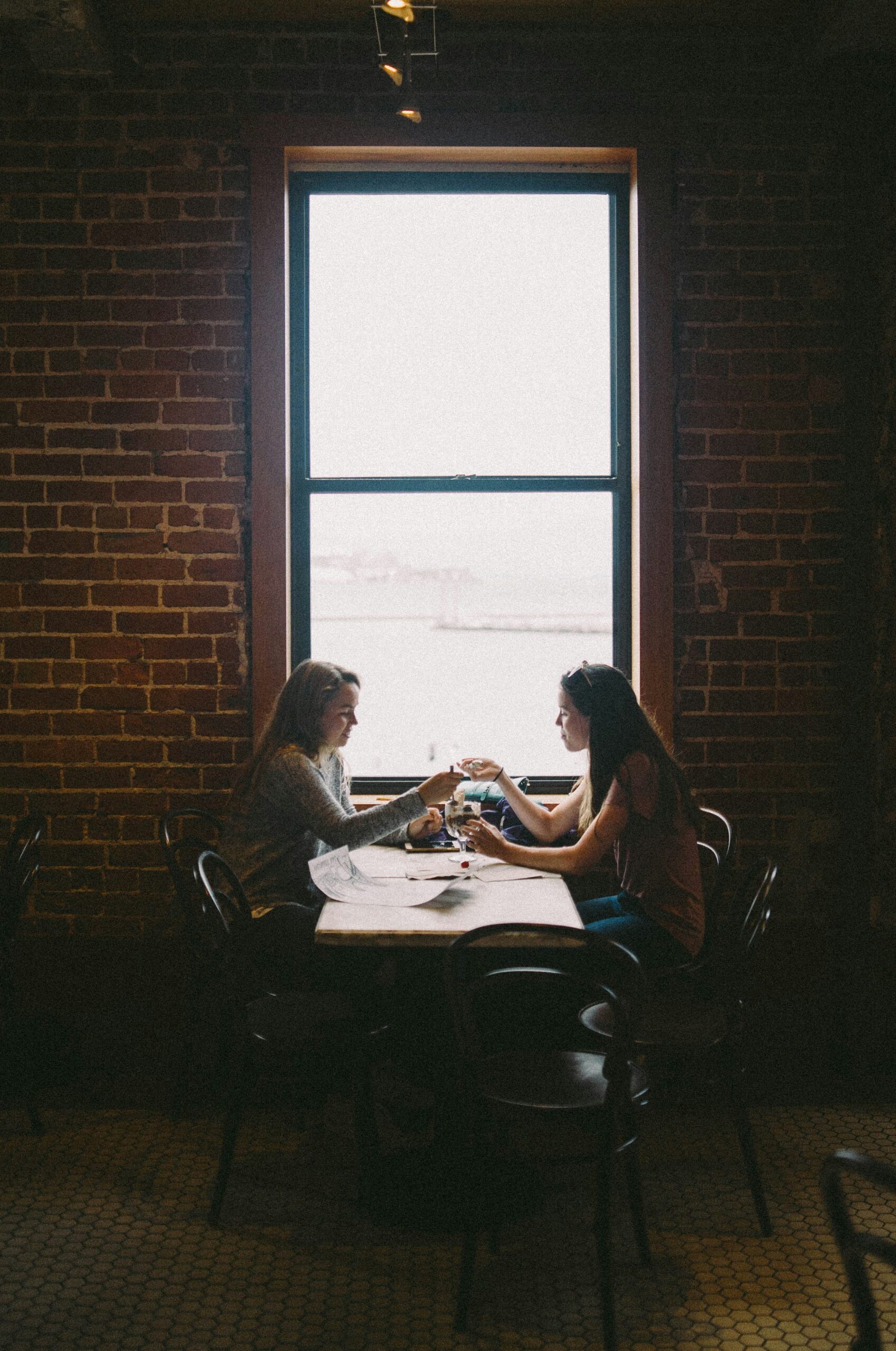 volunteers sitting having discussion at table