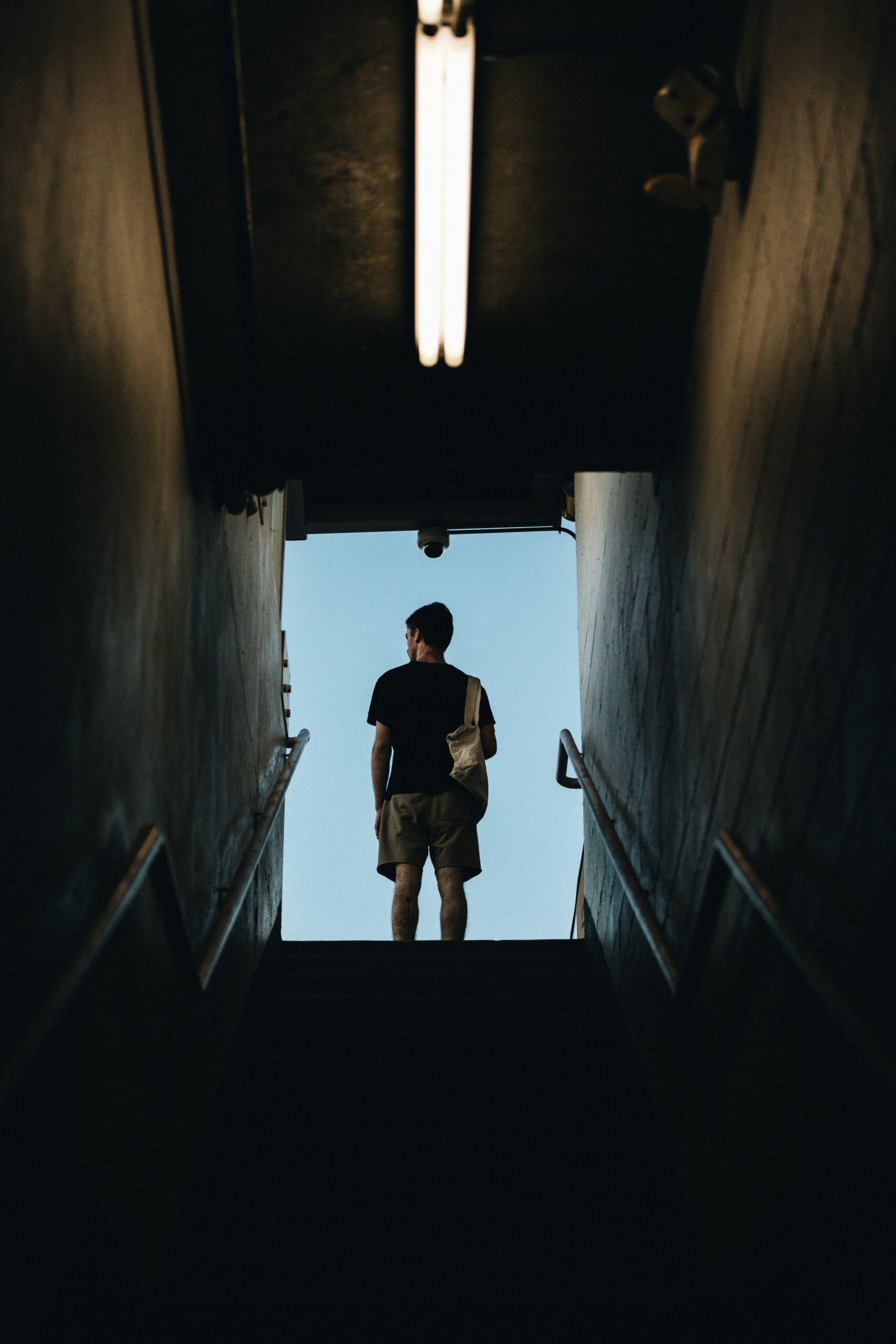 Man walking out of stairwell